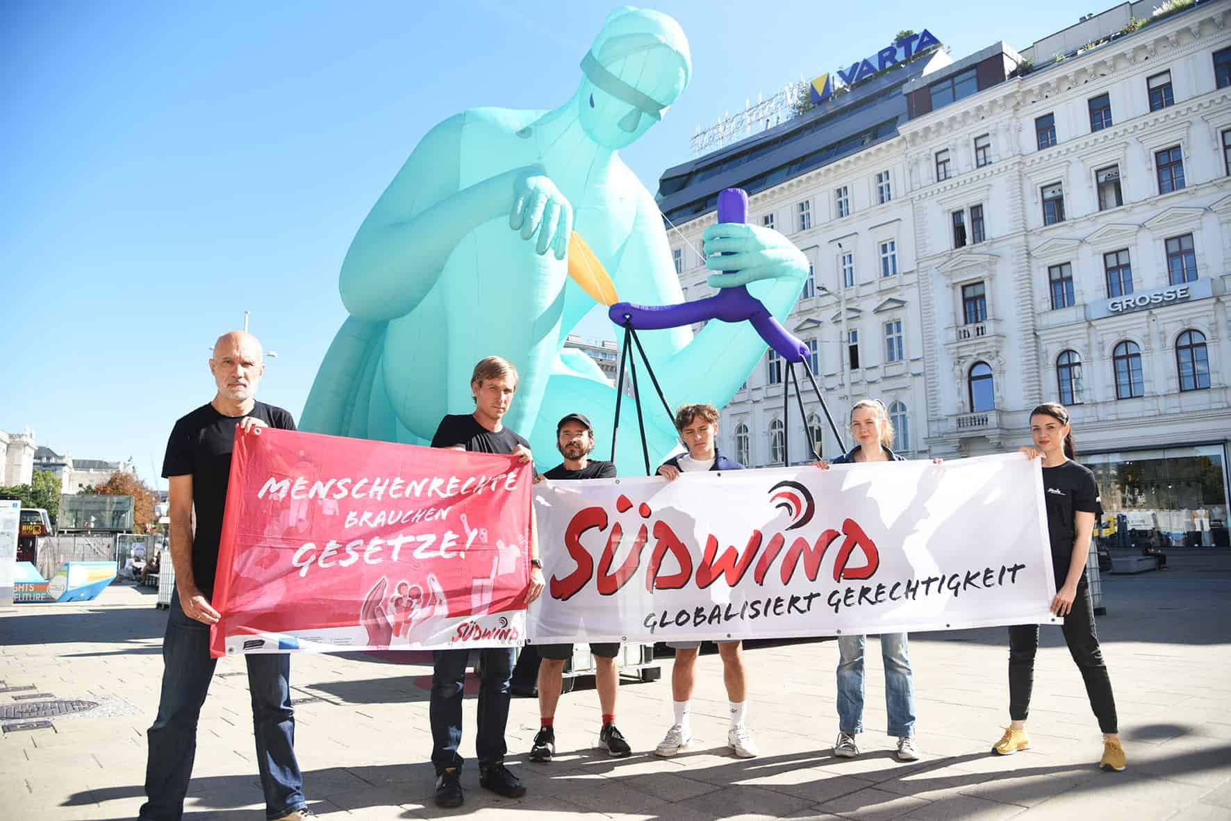 Südwind Banner mit Justitia Statue